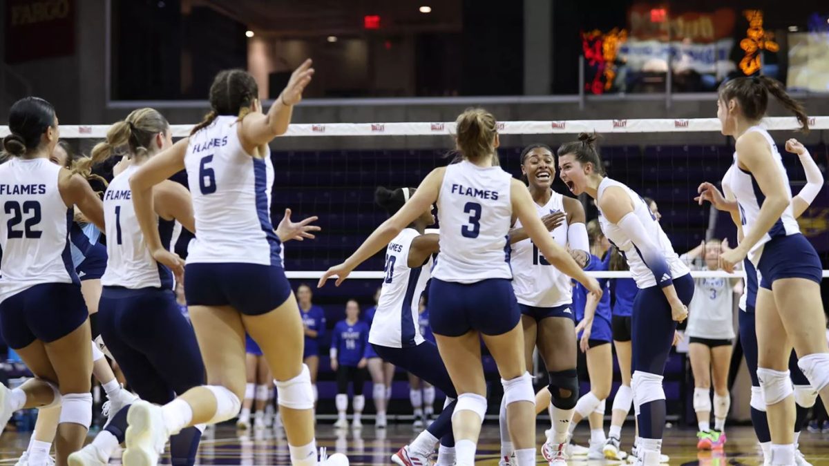 Missouri College volleyball teammates celebrate their win. 