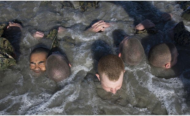 U.S. Navy SEAL candidates participate in Basic Underwater Demolition/SEAL (BUD/S) training. 