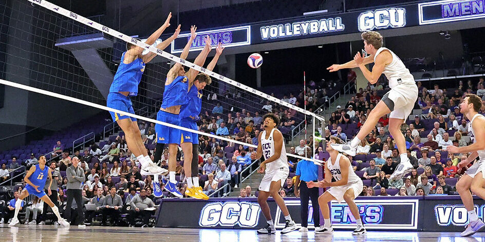 UCLA Bruins put up a monster 3 perolsn block. (AVCA)