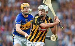 Players in the middle of a Hurling game.
